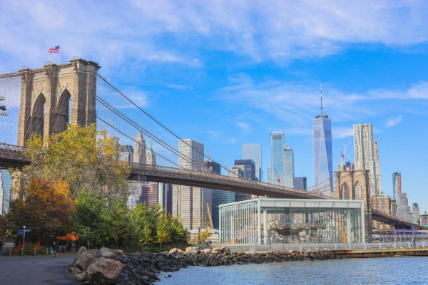 Cruise along the Brooklyn Bridge, stopping at the tower for some great photos