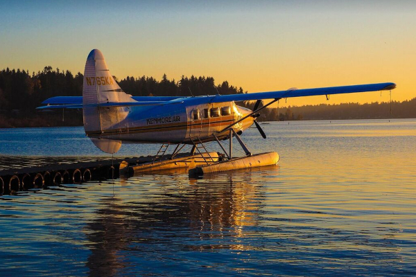 Hop aboard our chartered float plane for a spectacular flight over the islands straight back to Seattle.