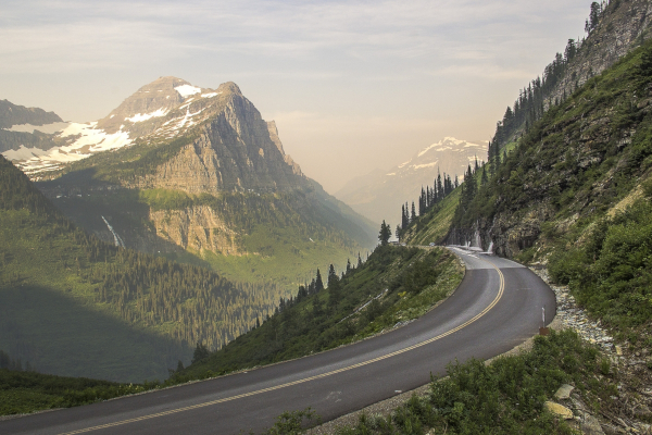 Climb to the Continental Divide at Logan Pass and ride into Montana on the North American Epic section 4